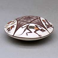 A polychrome seed pot decorated above the shoulder with a bird, rabbit, lizard and fineline geometric design, click or tap to see a larger version
