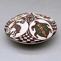 A polychrome seed pot decorated above the shoulder with a bird, rabbit, turtle, lizard and geometric design, click or tap to see a larger version