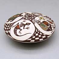 A polychrome seed pot decorated above the shoulder with a bird, rabbit, turtle, lizard and geometric design, click or tap to see a larger version