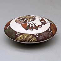 A polychrome seed pot decorated above the shoulder with a cloudeater, fish, fineline and geometric design, click or tap to see a larger version