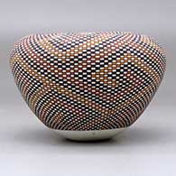 A polychrome jar with an Infinity rim and decorated with a tiny checkerboard-pattern geometric design, click or tap to see a larger version