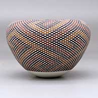 A polychrome jar with an Infinity rim and decorated with a tiny checkerboard-pattern geometric design, click or tap to see a larger version