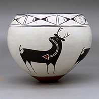 A polychrome bowl decorated around the body with a four-panel deer-with-heart-line design and with a butterfly geometric design around the opening, click or tap to see a larger version