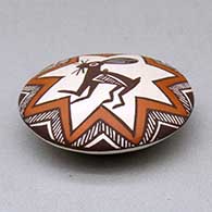 A miniature polychrome seed pot decorated with a Mimbres rabbit, fineline and geometric design above the shoulder, click or tap to see a larger version