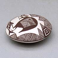 A miniature black on white seed pot decorated with a cloudeater, fish, fineline and geometric design above the shoulder, click or tap to see a larger version