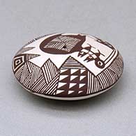 A miniature black on white seed pot decorated with a cloudeater, fish, fineline and geometric design above the shoulder, click or tap to see a larger version