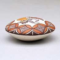 A miniature polychrome seed pot decorated with a parrot, branch and geometric design above the shoulder, click or tap to see a larger version