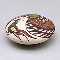 A miniature polychrome seed pot decorated with a bird, fineline and geometric design above the shoulder, click or tap to see a larger version