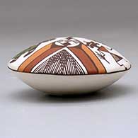 A polychrome seed pot decorated above the shoulder with a pueblo dancer, turtle, fineline and geometric design, click or tap to see a larger version
