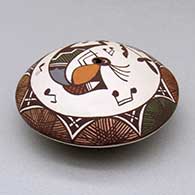 A polychrome seed pot decorated with a kokopelli, vine, fineline and geometric design above the shoulder, click or tap to see a larger version