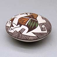 A polychrome seed pot decorated with a cloudeater, fish, fineline and geometric design above the shoulder, click or tap to see a larger version