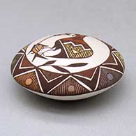 A polychrome seed pot decorated with a cloudeater, fish, fineline and geometric design above the shoulder, click or tap to see a larger version
