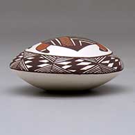 A polychrome seed pot decorated with a turtle, fineline and geometric design above the shoulder, click or tap to see a larger version