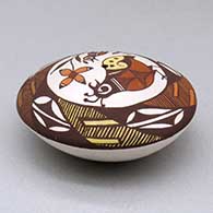 A polychrome seed pot decorated with a quail, fineline, plant and geometric design above the shoulder, click or tap to see a larger version