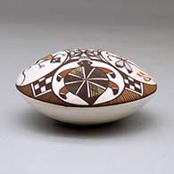 A polychrome seed pot decorated above the shoulder with a bird, lizard, turtle, dragonfly and geometric design, click or tap to see a larger version