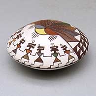 A polychrome seed pot decorated above the shoulder with a pueblo dancer, cloud formation, fineline and geometric design, click or tap to see a larger version