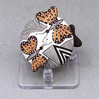 Click for a larger view A miniature polychrome seed pot decorated with butterfly wing appliques and a butterfly, fineline and geometric design
by Alisha Sanchez of Acoma