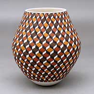 A polychrome jar decorated with a 3D geometric design
 by Frederica Antonio of Acoma