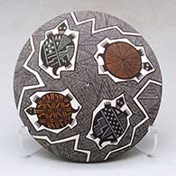 Click for a larger view A polychrome seed pot decorated with a fineline, turtle and geometric design above the shoulder
by Rebecca Lucario of Acoma