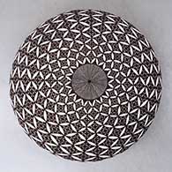 Click for a larger view A black on white seed pot decorated with a yucca leaf snowflake, North Star fineline and geometric design
by Rebecca Lucario of Acoma