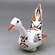 Click for a larger view A polychrome roadrunner figure decorated with a bird element and geometric design
by Judy Lewis of Acoma