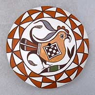 A polychrome seed pot decorated with a parrot, branch and geometric design
 by Diane Lewis of Acoma