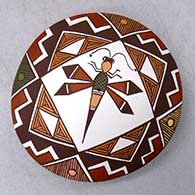 A polychrome seed pot decorated with a dragonfly, fineline, kiva step and geometric design
 by Diane Lewis of Acoma