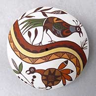 Click for a larger view A polychrome seed pot decorated with a bird, rainbow, plant and geometric design
by Diane Lewis of Acoma