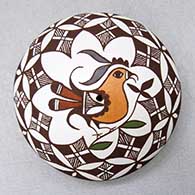 A miniature polychrome seed pot decorated with a parrot, branch, fineline and geometric design
 by Diane Lewis of Acoma