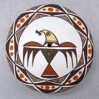 A miniature polychrome seed pot decorated with a thunderbird, fineline and geometric design
 by Diane Lewis of Acoma