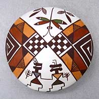 A miniature polychrome seed pot decorated with a pueblo dancer, dragonfly, checkerboard and geometric design
 by Diane Lewis of Acoma
