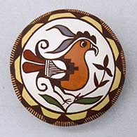 A miniature polychrome seed pot decorated with a parrot, branch and geometric design
 by Diane Lewis of Acoma