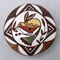 Click for a larger view A miniature polychrome seed pot decorated with a hummingbird, flower and geometric design
by Diane Lewis of Acoma