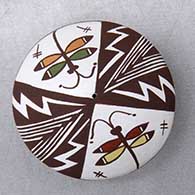 Click for a larger view A miniature polychrome seed pot decorated with a dragonfly, lightning bolt, fineline and geometric design
by Diane Lewis of Acoma