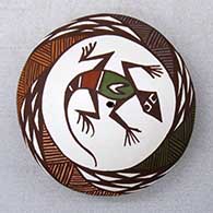 Click for a larger view A miniature polychrome seed pot decorated with a lizard, fineline and geometric design
by Diane Lewis of Acoma