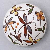 Click for a larger view A miniature polychrome seed pot decorated with a dragonfly, flower and geometric design
by Diane Lewis of Acoma