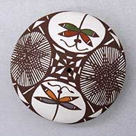 Click for a larger view A miniature polychrome seed pot decorated with a dragonfly, fineline and geometric design
by Diane Lewis of Acoma