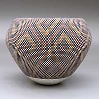 A polychrome jar with an Infinity rim and decorated with a geometric design built of tiny squares, click or tap to see a larger version