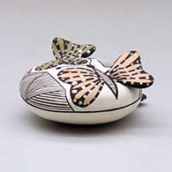 A miniature polychrome seed pot decorated with butterfly wing appliques and a butterfly, fineline and geometric design, click or tap to see a larger version