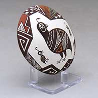 A polychrome seed pot decorated with quail head and lady bug appliques and a quail family and geometric design, click or tap to see a larger version