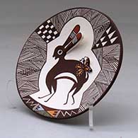A polychrome plate decorated with rabbit ear and lady bug appliques and a Mimbres rabbit, butterfly, fineline and geometric design, click or tap to see a larger version