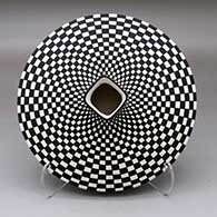 Click for a larger view A black on white flat jar with a square neck and opening, decorated with a checkerboard design above and below
by Paula Estevan of Acoma