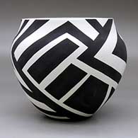 A black on white jar decorated with a hummingbird and geometric design, click or tap to see a larger version