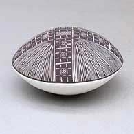 A black on white seed pot decorated above the shoulder with a fineline and geometric design, click or tap to see a larger version
