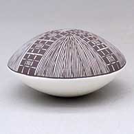 A black on white seed pot decorated above the shoulder with a fineline and geometric design, click or tap to see a larger version
