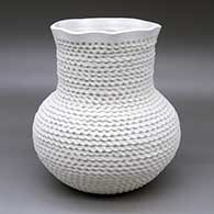 A corrugated white jar with a pie crust rim
 by Jackie Shutiva of Acoma