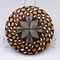 A polychrome seed pot decorated above the shoulder with a fineline, checkerboard and geometric design
 by Sharon Lewis of Acoma