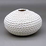 A corrugated white seed pot jar
 by Jackie Shutiva of Acoma
