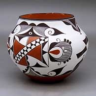 A polychrome jar decorated with a four panel fineline, bird element and geometric design
 by Franklin Peters of Acoma