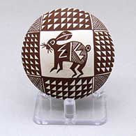 Click for a larger view A black on white seed pot decorated with an ancient Mimbres rabbit, fineline and geometric design
 by Diane Lewis of Acoma